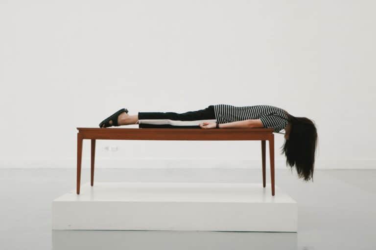 woman planked on a table