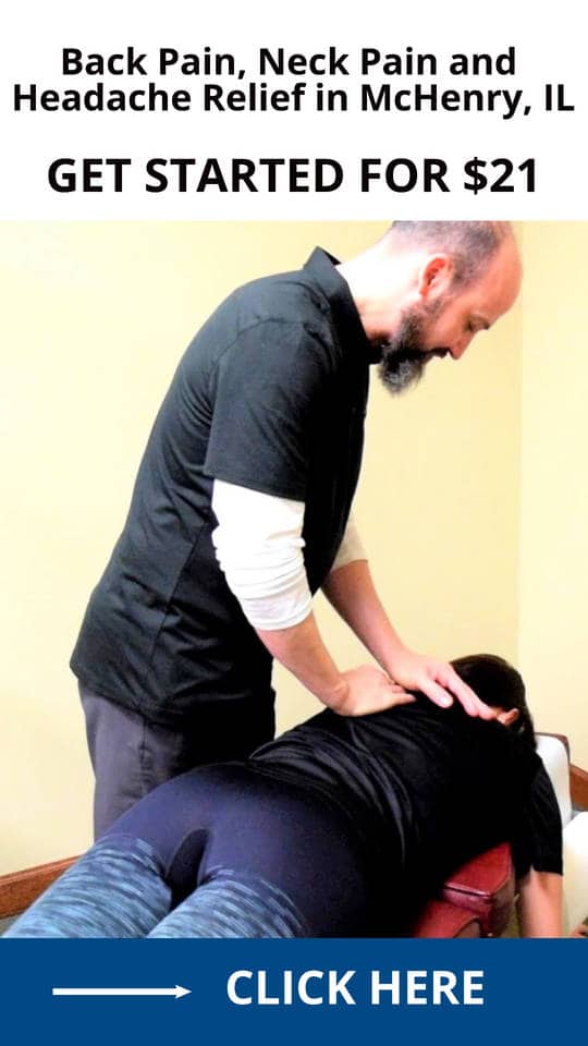 Dr Casey McGuire in McHenry performing chiropractic adjustment
