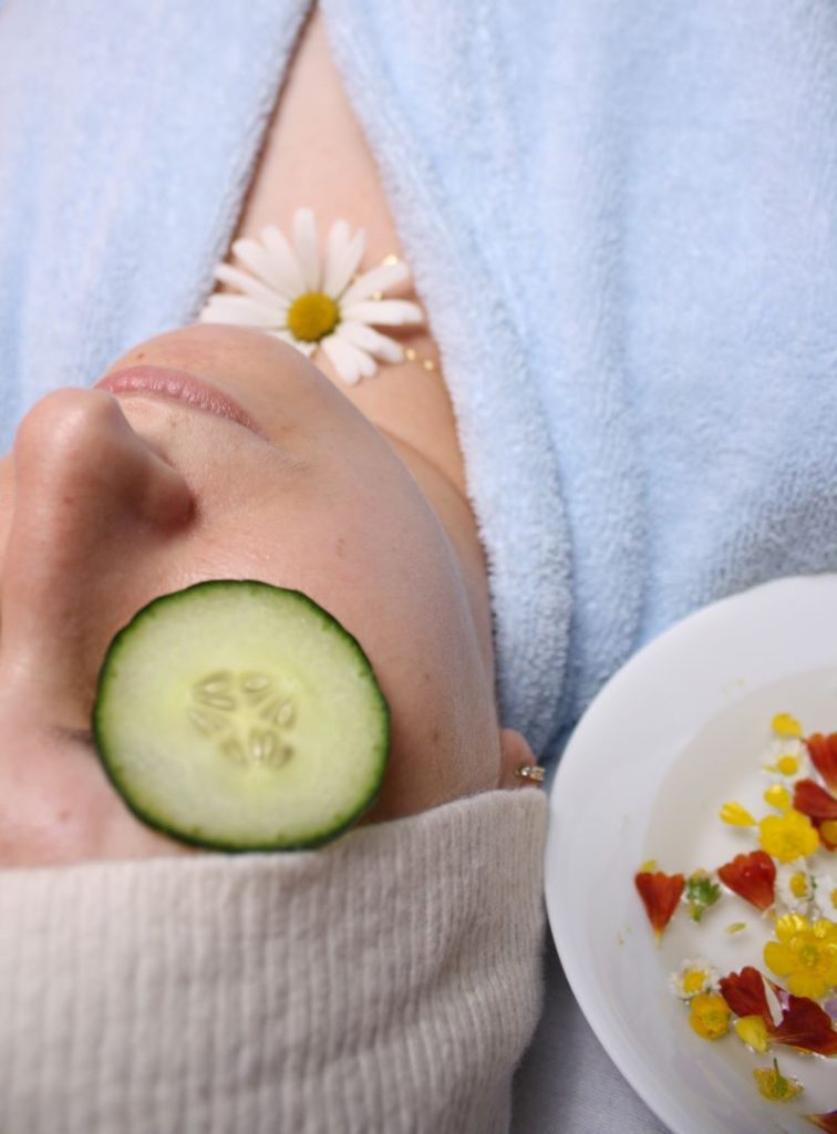 Woman with healthy skin getting spa treatment